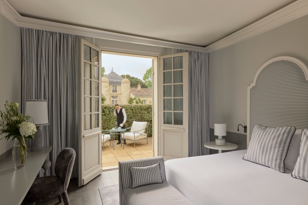1779416941.jpg MM 26 Garden Terrace room with staff.jpg